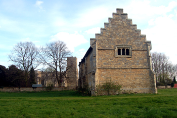 The stables with the church in the background April 2010